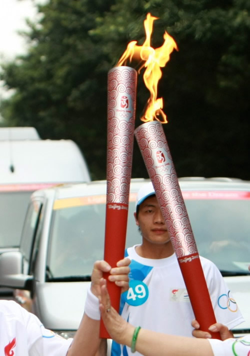 谁是08北京奥运火炬祥云幕后推手?